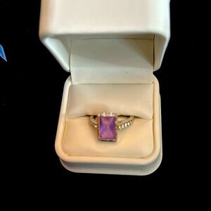 Avon Silver Ring with purple stone
Med or large
New still in box
Never worn